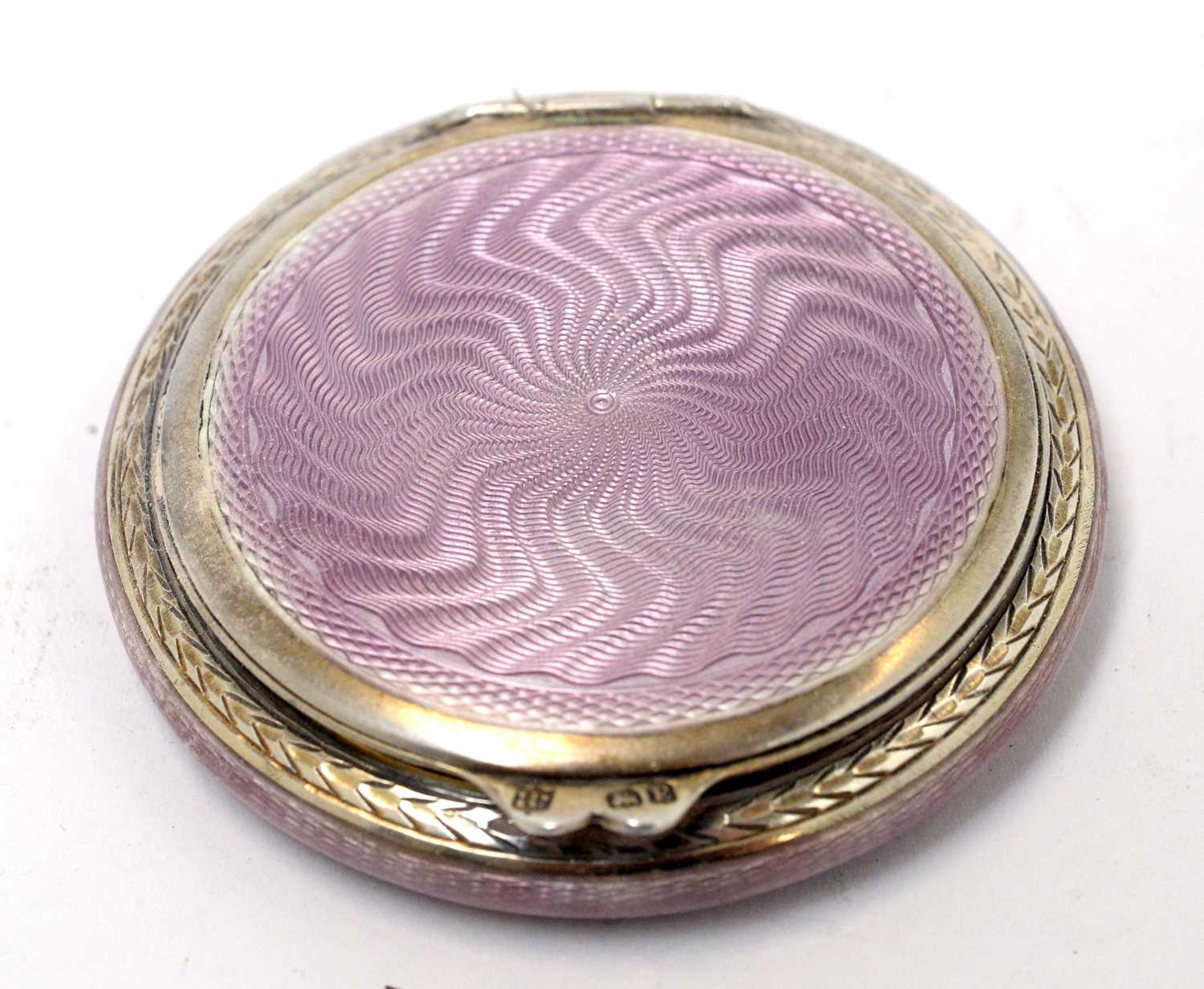 Lot 160 - A George V silver and purple enamel powder compact