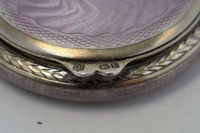 Lot 160 - A George V silver and purple enamel powder compact