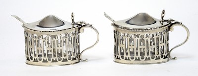 Lot 156 - A pair of George V silver mustard pots