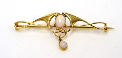 Lot 135 - Murrle Bennett & Co: an opal and yellow metal brooch