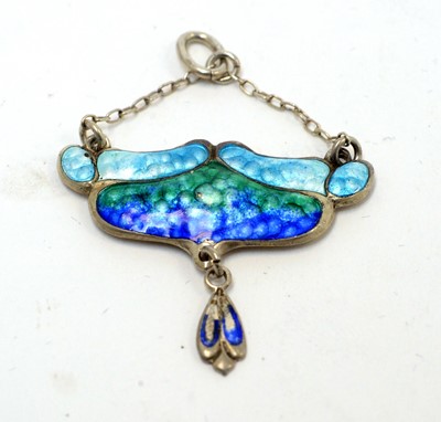 Lot 137 - An Arts and Crafts silver and blue enamel pendant