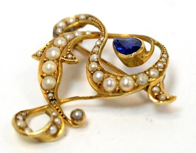 Lot 139 - An Edwardian seed pearl and sapphire brooch