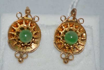 Lot 250 - A green stone gold earrings
