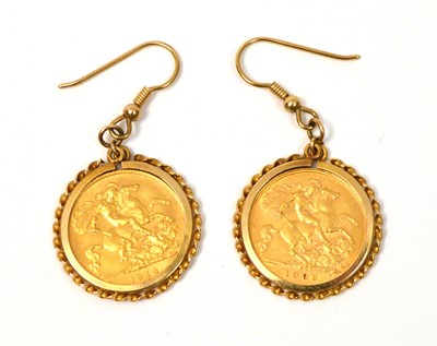 Lot 124 - Two gold half sovereigns in earring mounts
