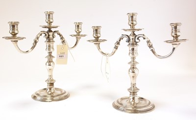 Lot 161 - A pair of Elizabeth II silver three branch candelabra