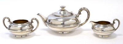 Lot 162 - A George V silver three piece tea service