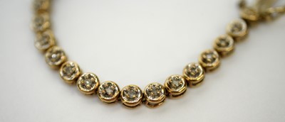 Lot 164 - A 9ct gold and diamond set tennis bracelet