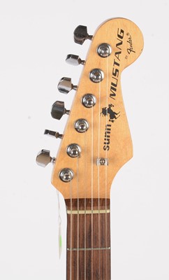 Lot 78 - A Sunn Mustang Strat style guitar by Fender
