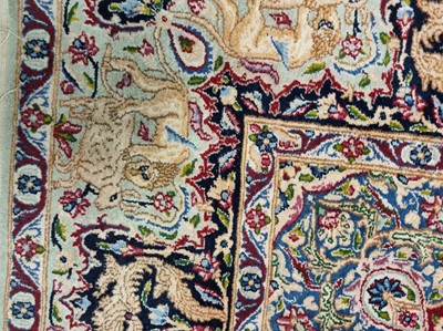 Lot 383 - A Kirman carpet
