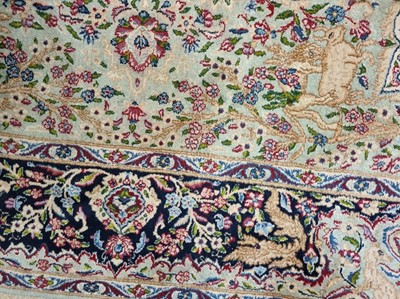 Lot 383 - A Kirman carpet