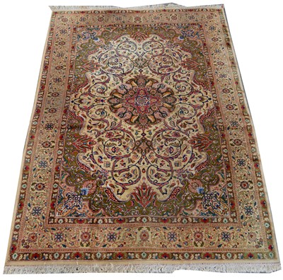 Lot 98 - A Tabriz carpet