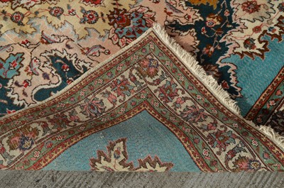 Lot 387 - A Tabriz carpet