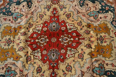 Lot 387 - A Tabriz carpet