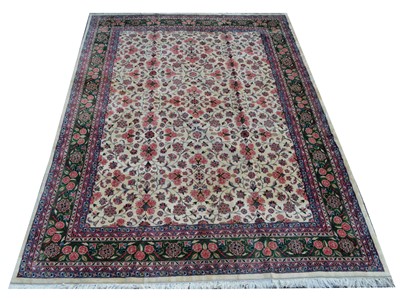 Lot 395 - A Kashan carpet