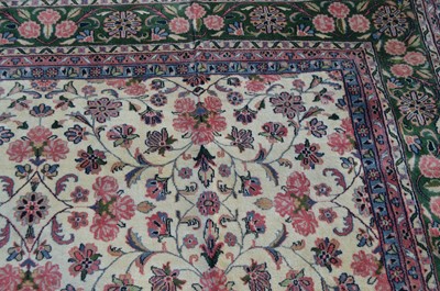 Lot 93 - A Kashan carpet