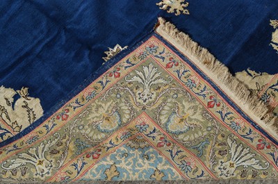 Lot 406 - A part silk Qum carpet