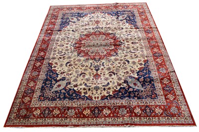 Lot 411 - A part silk Isfahan carpet