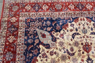 Lot 676 - A part silk Isfahan carpet