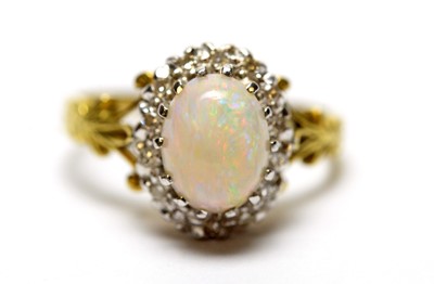 Lot 259 - An opal and diamond cluster ring