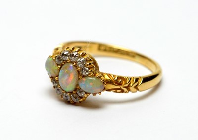 Lot 265 - An opal and diamond ring