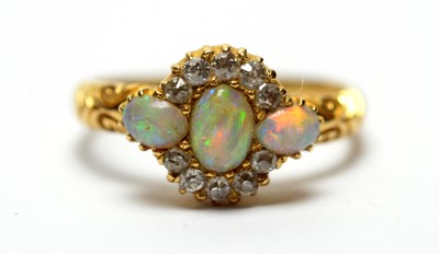 Lot 265 - An opal and diamond ring