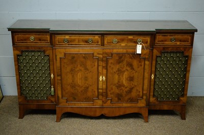Lot 57 - A reproduction breakfront side cabinet