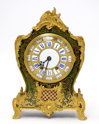 Lot 561 - Louis XV style boulle work and gilt bronze mantel clock.