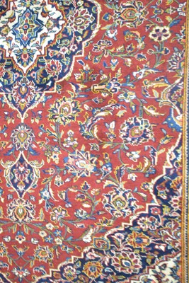 Lot 635 - A Kashan carpet.