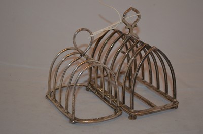 Lot 208 - Two silver toast racks