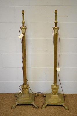 Lot 49 - A pair of brass column-form lamp standards