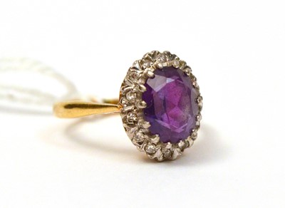 Lot 117 - An amethyst and diamond cluster ring