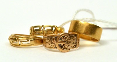 Lot 129 - Four gold rings.