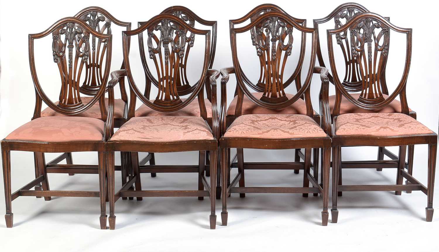 Lot 40 - A set of eight Georgian-style mahogany dining chairs.