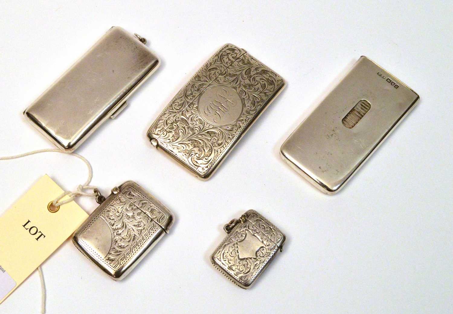 Lot 160 - Compact, card case and vestas.