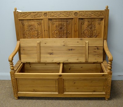 Lot 21 - A modern carved pine hall seat in the Victorian style