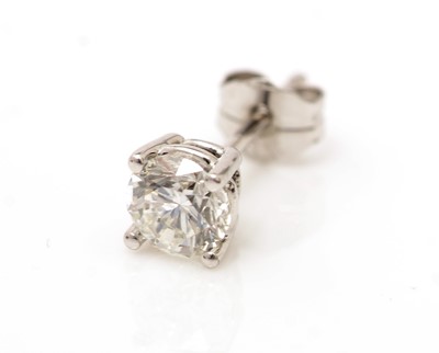 Lot 297 - A pair of diamond stud earrings