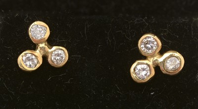 Lot 302 - A pair of diamond earrings