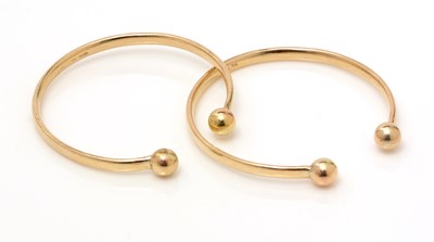 Lot 305 - Two 9ct yellow gold child's bangles