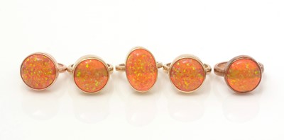Lot 319 - Five synthetic fire opal rings