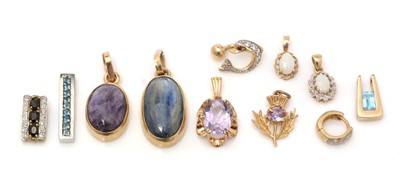 Lot 344 - A selectin of gem set pendants
