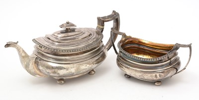 Lot 348 - A George III silver teapot and two handled sugar bowl