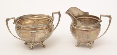 Lot 355 - A silver milk jug and two handled sugar bowl