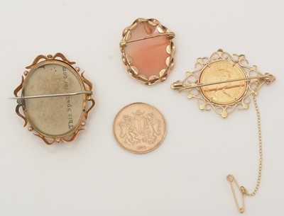 Lot 390 - Three brooches and a medallion.