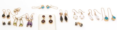 Lot 394 - Twelve pairs of gem-set earrings