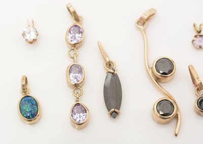 Lot 396 - Nine gem-set pendants
