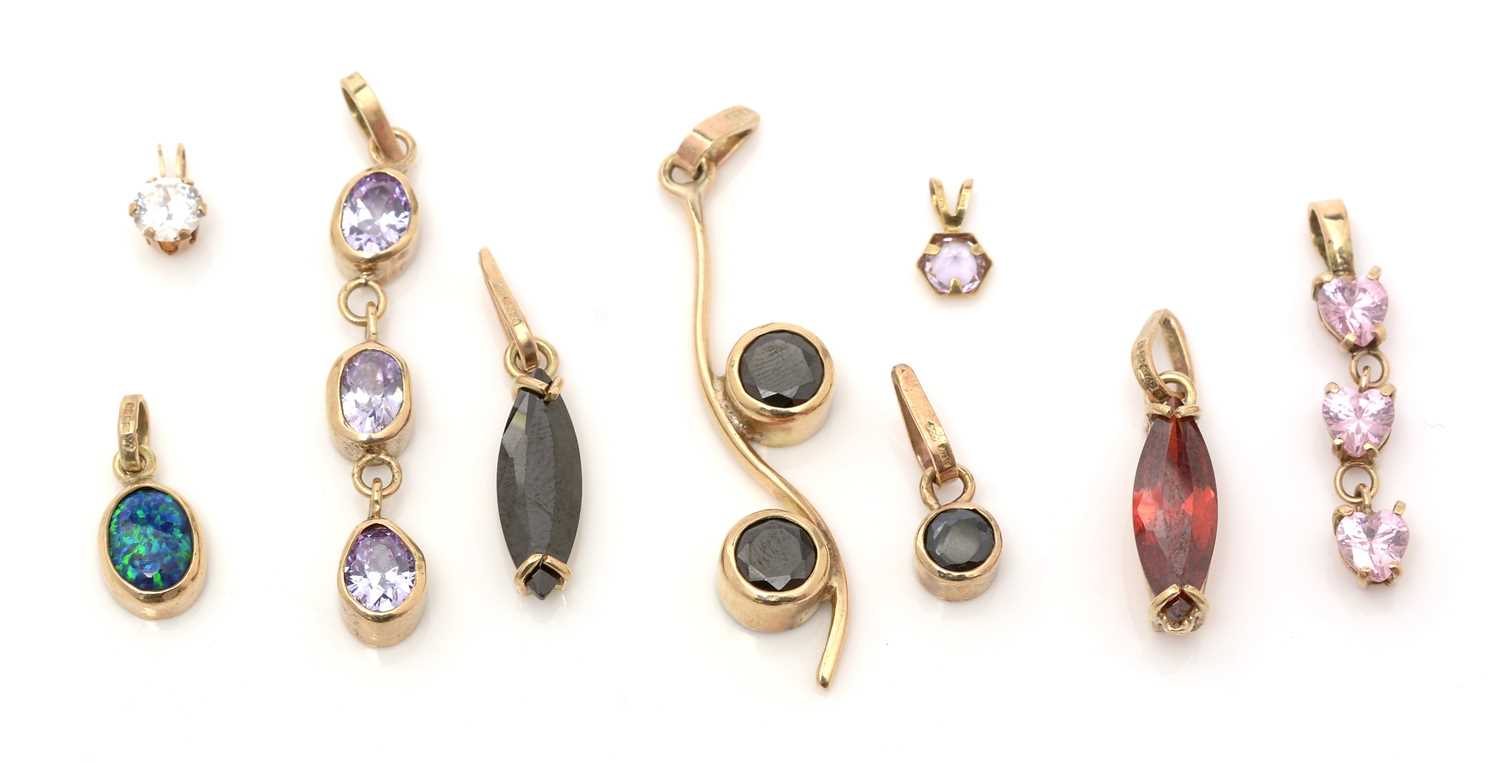 Lot 396 - Nine gem-set pendants