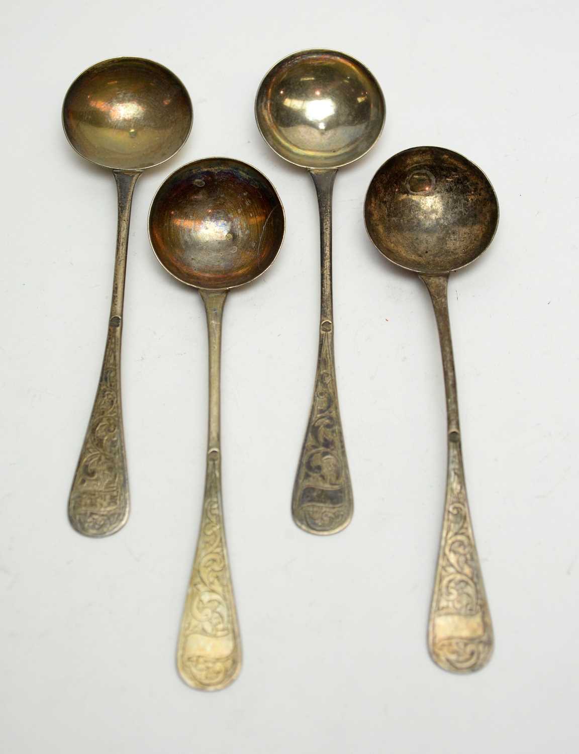 Lot 188 - A set of four Indian table spoons