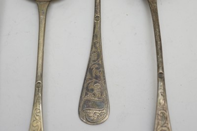 Lot 188 - A set of four Indian table spoons