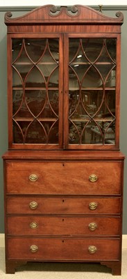 Lot 1073 - A George III mahogany secretaire bookcase