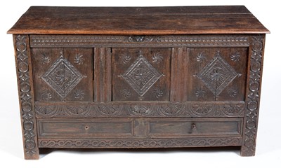 Lot 1076 - A carved oak mule chest with late 17th/18th Century elements